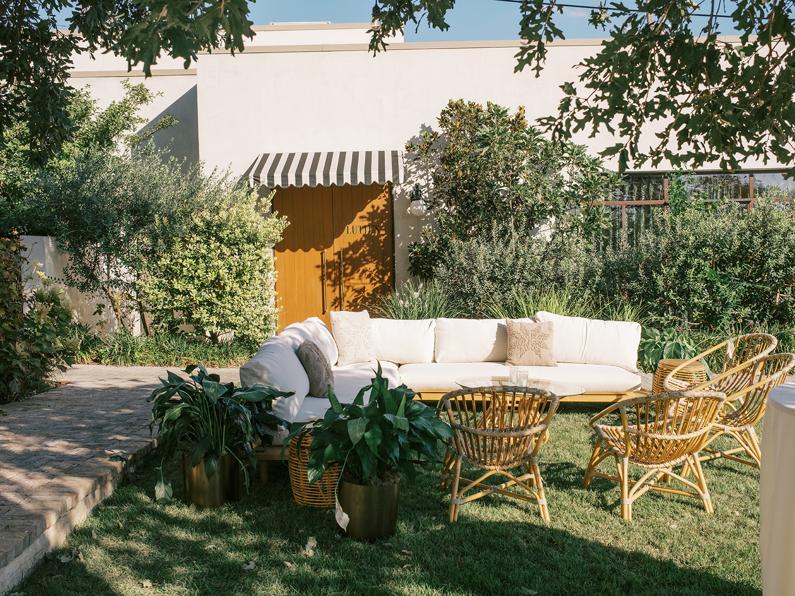 A beautiful backyard lounge that is an essential summer fun party rental